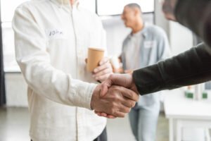 We do recover, sober living in columbus ohio, man extending a hand, hand shake