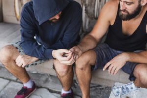 Men's Sober living in Columbus Ohio, Men in addiction, addiction recovery, smoking weed, passing a joint, marajuana