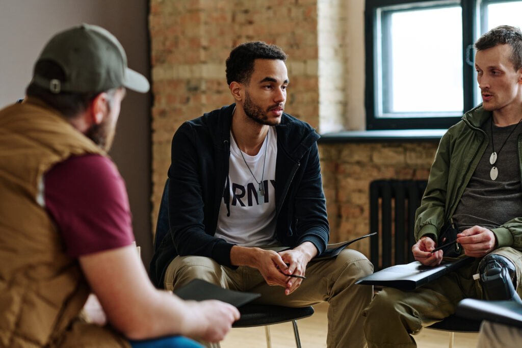 Men participating in a Christian addiction recovery support group at an affordable sober living program in Columbus, Ohio focused on healing and accountability.